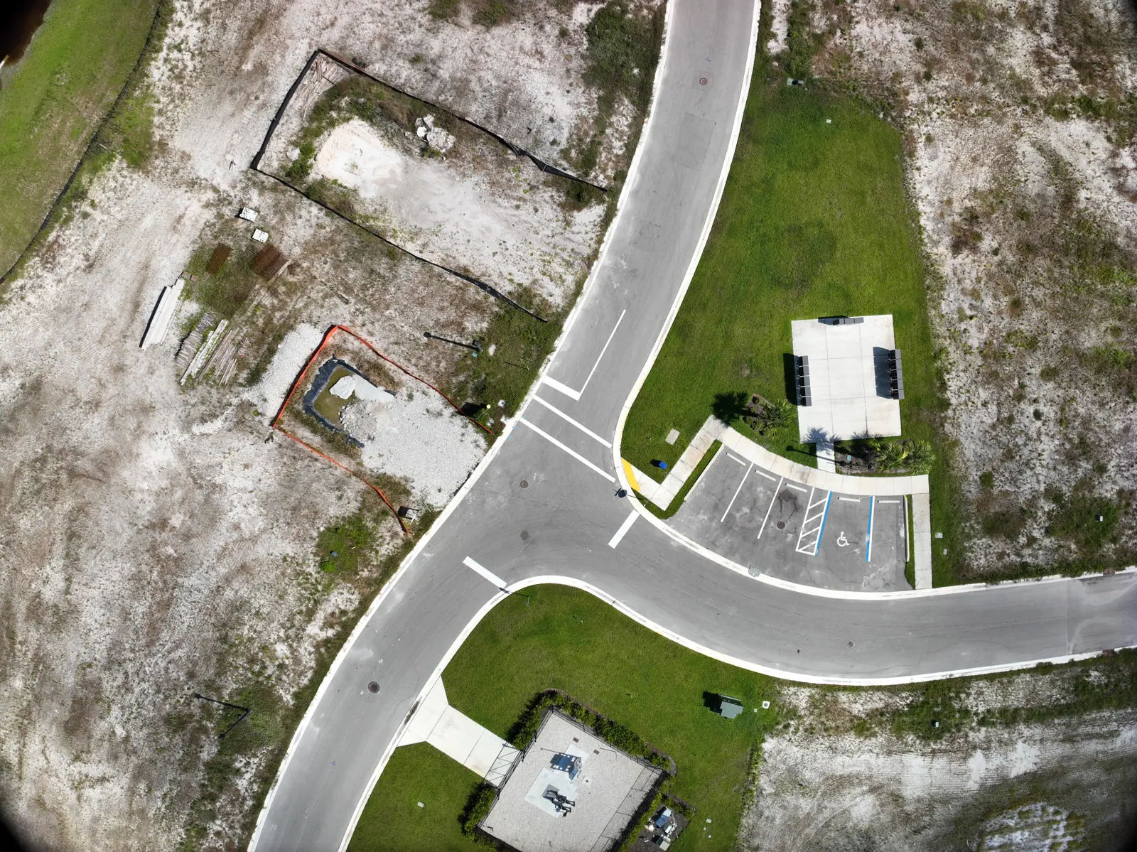 Overhead view of a development site entrance under construction